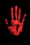 Red human hand print on black background isolated close up, bloody handprint illustration, palm and fingers silhouette mark