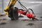 Red hydraulic excavator drill