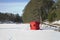 Red ice fishing shelter on a remote Minnesota lake