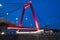 Red illuminated Willems Bridge in Rotterdam