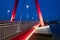 Red illuminated Willems Bridge in Rotterdam