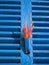 Red Incense on Blue Window Shutters