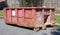 Red industrial dumpster