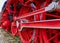 Red iron wheels and connecting rods of a historic locomotive