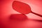 Red isolated plastic fly trap on intense colored background