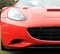 Red italian modern sports car headlamp and grill