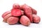Red Japanese sweet potatoes on a white background