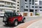 Red Jeep Wrangler Rubicon parked in Miraflores, Lima