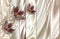 Red Jewelry flowers, vertical stripes, pale-pink silk background.