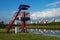 Red judge`s tower on the bank of the academic rowing channel