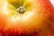 Red juicy apple closeup appetizing fruit background