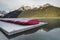 Red kayaks, Lake Louise, Banff National Park, Alberta, Canada