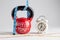 Red kettlebell with Workout Time lettering, traditional alarm cl