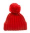 Red knit winter bobble hat isolated on white