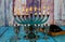 Red kosher four glasses wine with Chanukah Menorah Chanukiah Jewish holiday background