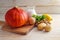 Red kuri squash and ingredients for a vegan autumn soup with coconut milk, ginger and coriander for Thanksgiving and Halloween on