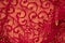 Red lace garment material background