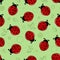 Red ladybugs, ladybirds with green leaves vector seamless background