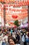 red lanterns over crowd on gerrard steet, chinatown london