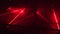 Red laser beams used in security demonstration at night. Panorama. 4K