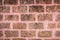 Red laterite brick wall