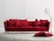 Red leather sofa in classic white style interior