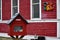 Red Lending Library in Front of Red Building