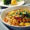 Red lentil stew with potato, carrot and turmeric.