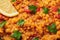 Red lentils dal close up. Lentils tomato dhal is indian cuisine dish. Indian food. Asian vegetarian meal