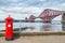 Red letterbox and Firth of Forth rail bridge