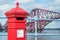 Red letterbox and Firth of Forth rail bridge