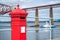 Red letterbox and Firth of Forth rail bridge