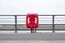 Red life safety ring buoy at port harbour harbor prevent drowning in sea cannot swim