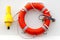Red lifebuoy with rope