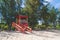 Red Lifeguard hut along shore of Seven Sea beach in tropical Fajardo Puerto Rico