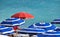 Red lifeguard sunshade umbrella on blue