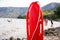 Red Lifesaver lifeguard in sand at beach.