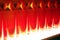 Red light illuminated glass bottles abstract background