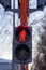 Red light on a pedestrian traffic light. Safe crossing of the road