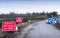 Red light traffic light on rural country road UK roadworks