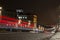 red light trails of vehicles on the night city highway