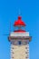Red lighthouse with blue sky in Portugal
