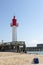 Red lighthouse on the coast of Trouville