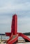 Red lighthouse with curved staircase