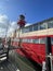 Red Lighthouse mounted atop a ship