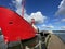 Red Lighthouse mounted atop a ship