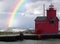 red lighthouse with rainbow