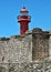 Red lighthouse with wall in Figuera da Foz, centro - Portugal