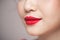 Red Lips closeup. Make up concept. Beautiful Perfect Lips.