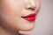 Red Lips closeup. Make up concept. Beautiful Perfect Lips.